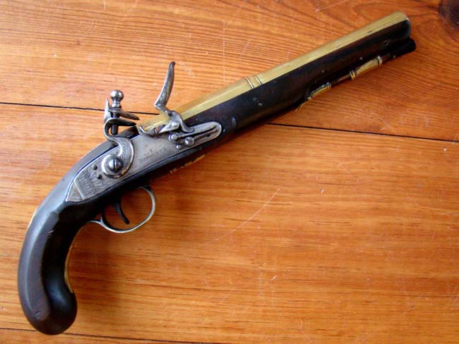 A pair of English flintlock brass barreled coaching pistols by John Bennett circa 1790 — image 5